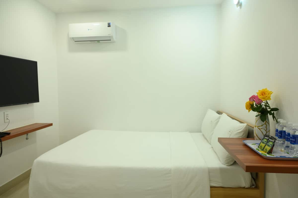 Minibar, desk, laptop workspace, blackout curtains