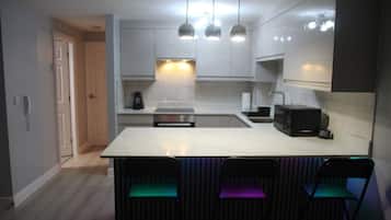 Microwave, oven, electric kettle, cookware/dishes/utensils