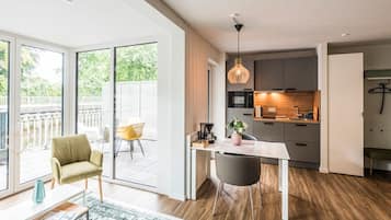 Fridge, microwave, stovetop, coffee/tea maker