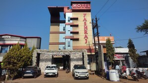 A hotel named Yashraj with a modern facade, multiple floors, and a prominent entrance. - Hotel Yash Raj (Sihora)