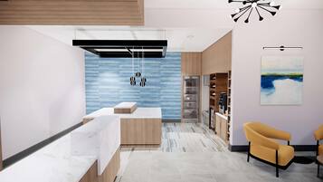 A modern reception area with a marble counter, wooden shelving, and a blue textured wall.