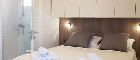 Apartamento (One-Bedroom Deluxe City View Apartmen) | 1 quarto, Wi-Fi de cortesia