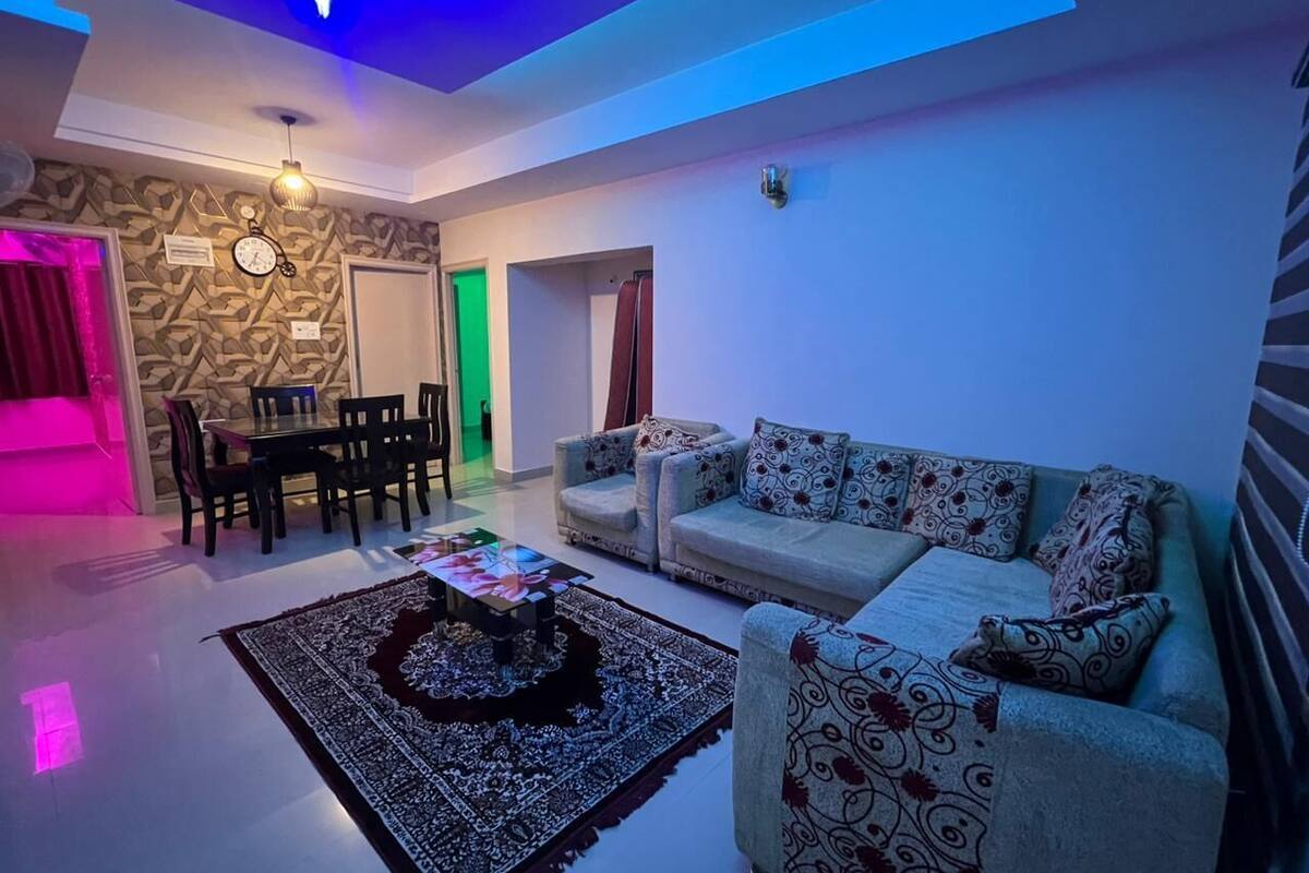 Deluxe Apartment | Living area | LED TV