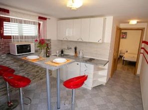 Apartment (One-Bedroom Apartment) | Private kitchen | Fridge - Apartments Sun Dance With Heated Pool (Novalja)