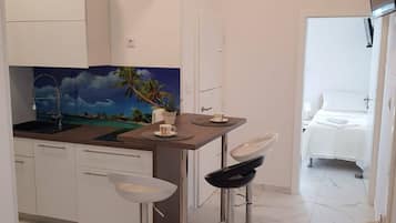 Apartment (One-Bedroom Sea View Apartment) | Private kitchen | Fridge