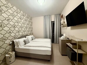 Minibar, una cassaforte in camera, tende oscuranti, ferro/asse da stiro