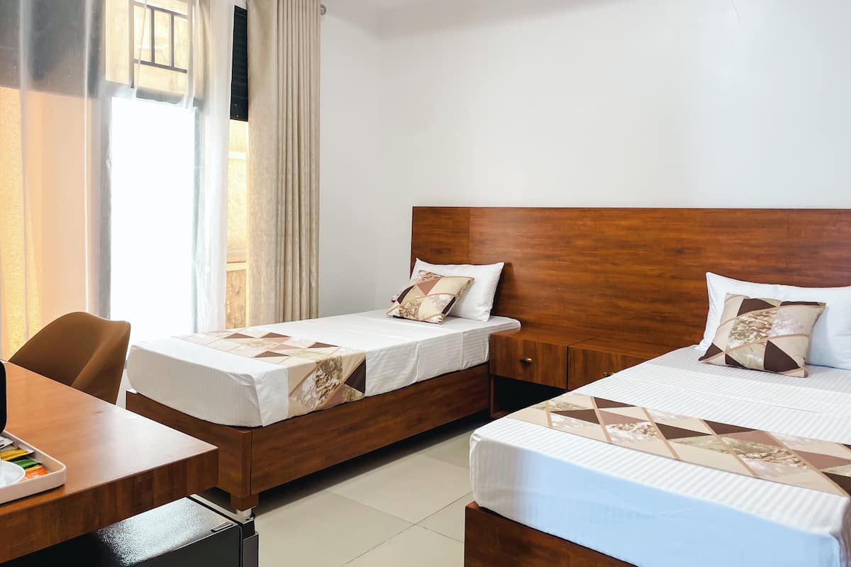 FamilieTwin kamer | Gratis wifi, beddengoed