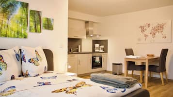 1 slaapkamer, een strijkplank/strijkijzer, wifi, beddengoed