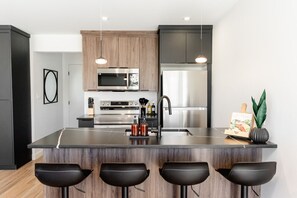 Private kitchen - Stylish & Spacious | Minutes from Downtown (Winnipeg)