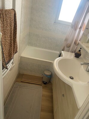 Hair dryer, towels, soap, toilet paper