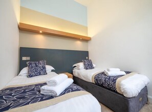 2 dormitorios y ropa de cama