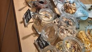 A buffet counter with various food items and condiments. - Restaurant & Hotel Einhorn (Oppenweiler)