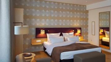 Superior Suite, Balcony, City View | In-room safe, desk, laptop workspace, blackout curtains