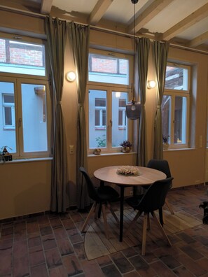 Studio, 1 Bedroom, Smoking, Patio | Dining room - New Studio-style Holiday Apartment in the Historic old Town of Quedlinburg (Quedlinburg)