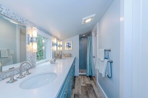 Shower, eco-friendly toiletries, hair dryer, towels