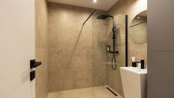 Apartment, 2 Bedrooms, Balcony | Bathroom | Shower, free toiletries, hair dryer, slippers