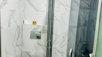 Hair dryer, bathrobes, slippers, towels