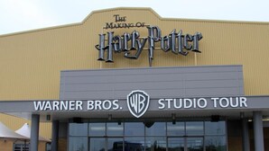 A building with a sign for 'The Making of Harry Potter' and 'Warner Bros. Studio Tour'.