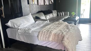 1 bedroom, desk, iron/ironing board, travel crib