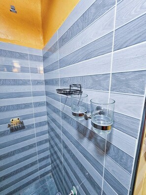Shower, towels, soap, toilet paper - Hibiscus Haven -Olali Suites Migori- (Migori)