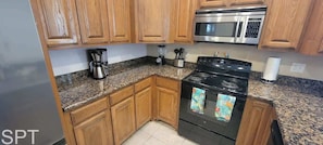 Condo, Multiple Beds, Kitchen (Island Time #4) | Private kitchen | Fridge, microwave, oven, stovetop
