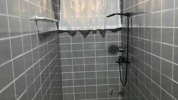 Shower, towels, soap, toilet paper