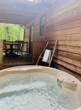 Terrace/patio. NEW LISTING!Mountain Cabin on 3acres w/HOT TUB CLOSE TO SEVIERVILLE PIGEON FORGE