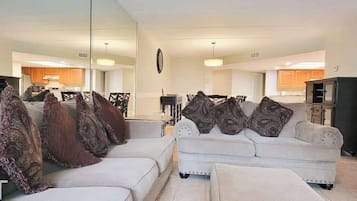 Condo, Multiple Beds, Patio, Garden View (Saida Towers IV #108) | Living area | 42-inch flat-screen TV with digital channels