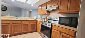 Condo, Multiple Beds, Patio, Garden View (Saida Towers IV #108) | Private kitchen | Fridge, microwave, oven, stovetop