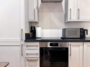 Fridge, microwave, oven, stovetop - Bright & Cosy 1-Bed Home | Heart of Maidstone (Kent)