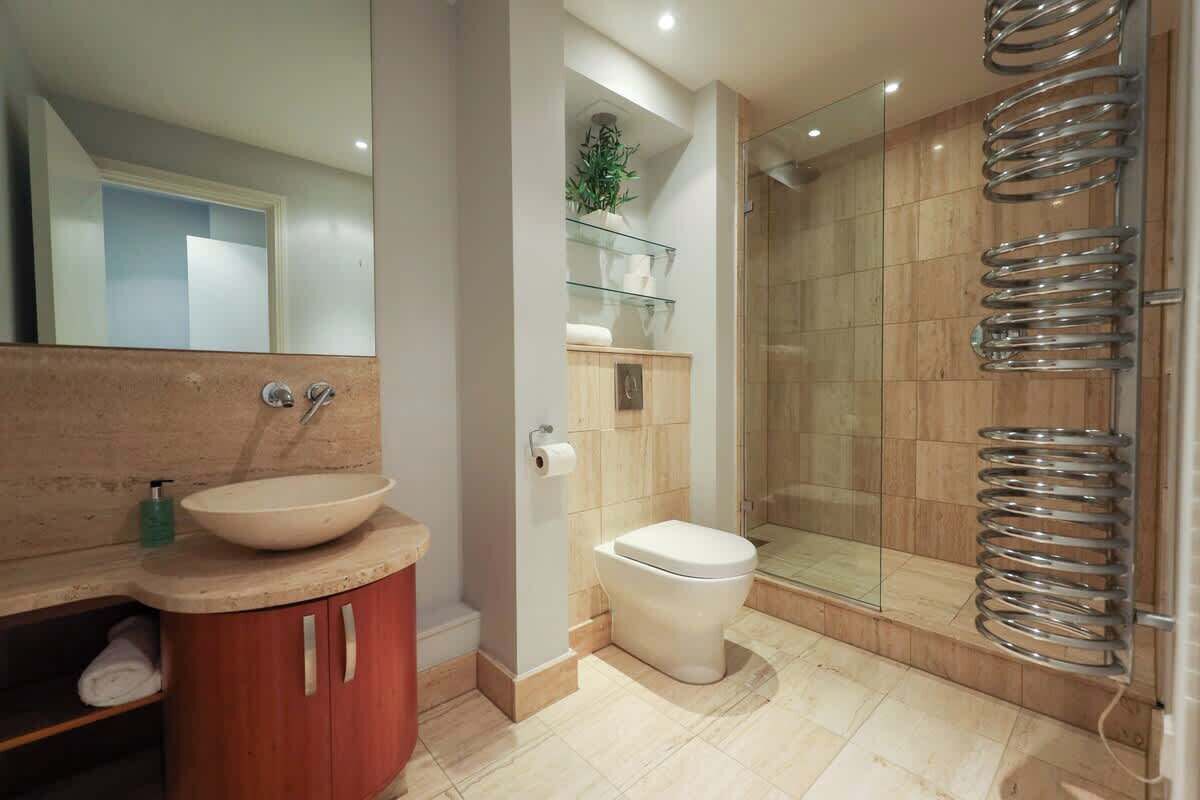 Shower, hair dryer, bathrobes, towels