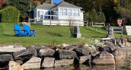 Charming cottage on Lake Willoughby w/ sun porch, private deck and dock.