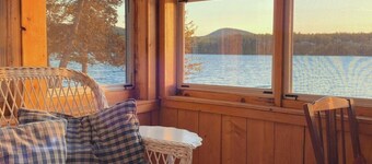 Charming cottage on Lake Willoughby w/ sun porch, private deck and dock.