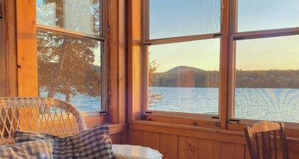 Charming cottage on Lake Willoughby w/ sun porch, private deck and dock.