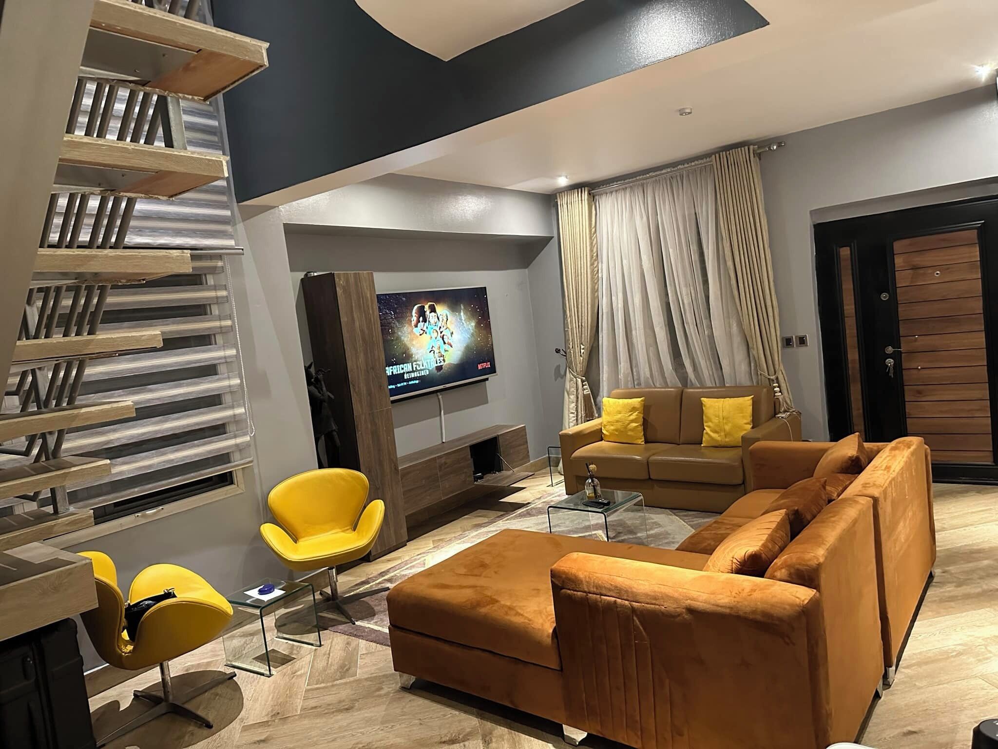 Familienapartment, Balkon, Stadtblick | Wohnbereich