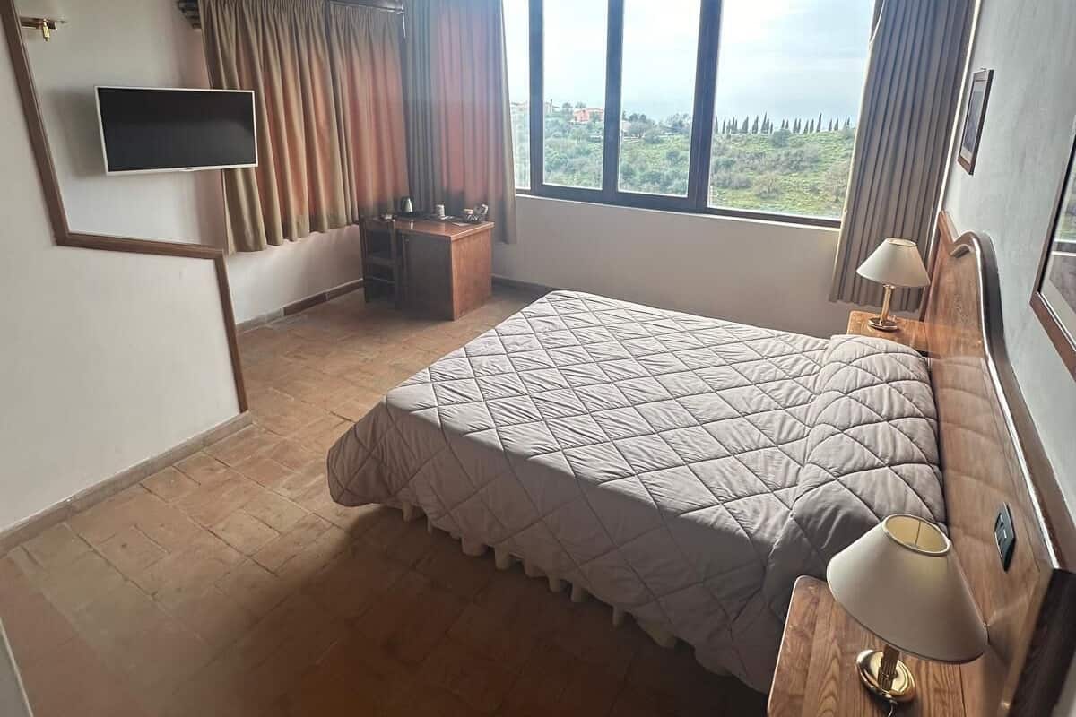 Superior Double or Twin Room, Patio, Sea View | Down comforters, minibar, in-room safe, desk