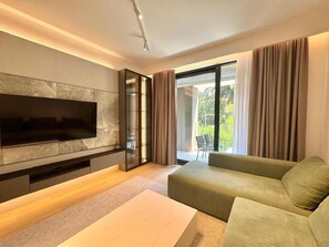 Deluxe Apartment, City View | Living area | 50-inch Smart TV with digital channels - Two bedroom Apartment Onia (Budva)