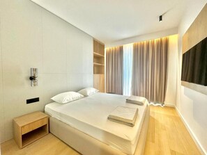 Apartamento Deluxe, vistas a la ciudad | 2 dormitorios, sistema de insonorización, wifi gratis