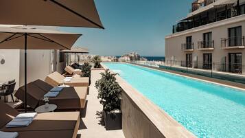 Indoor pool, 2 outdoor pools, pool umbrellas, pool loungers