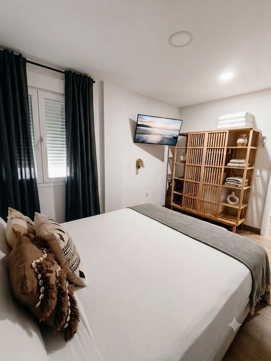 3 habitaciones, tabla de planchar con plancha, wifi y ropa de cama 