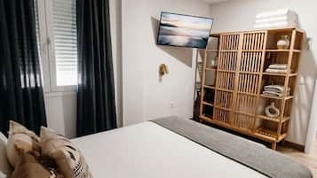 3 habitaciones, tabla de planchar con plancha, wifi y ropa de cama
