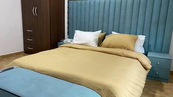 Family Apartment, Balcony, City View | 1 bedroom, desk, laptop workspace, blackout drapes