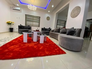 Family Apartment, Balcony, City View | Living area - Comforts Court And Apartment (Lekki)