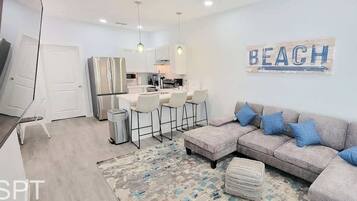 Townhome, Multiple Beds, Kitchen, Garden View (Villas de Laguna 1) | Living area | 75-inch flat-screen TV with digital channels