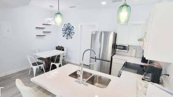 Townhome, Multiple Beds, Kitchen, Garden View (Villas de Laguna 1) | Private kitchen | Fridge, microwave, oven, stovetop