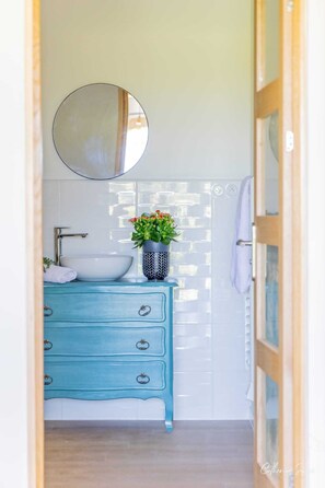 Shower, hair dryer, towels, soap