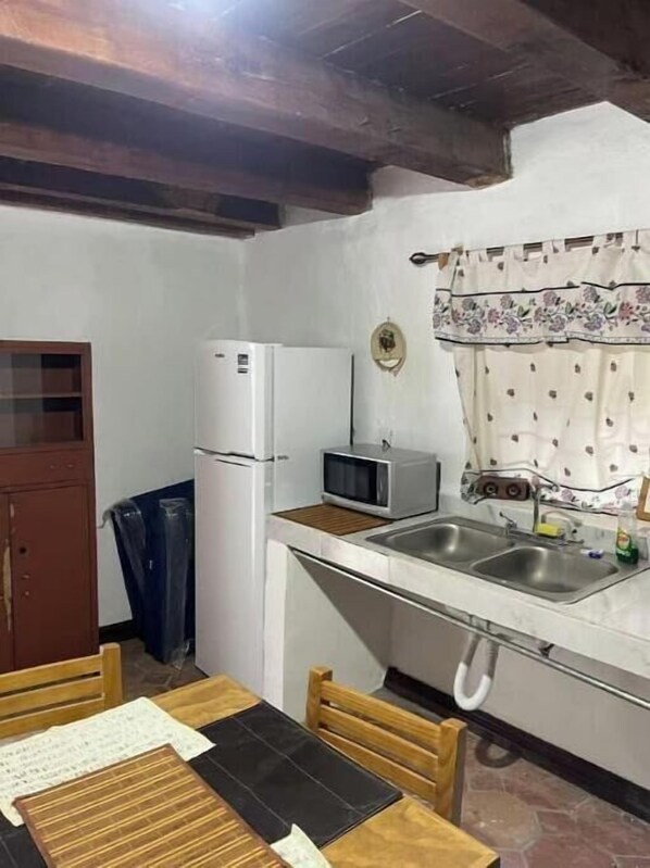 Microwave, coffee/tea maker, cookware/dishes/utensils