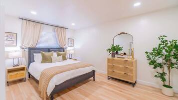 1 bedroom, desk, iron/ironing board, travel crib