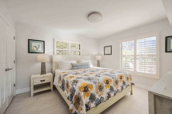 Beautiful Bedrooom with King size bed and natural light; Two nightstand and dresser