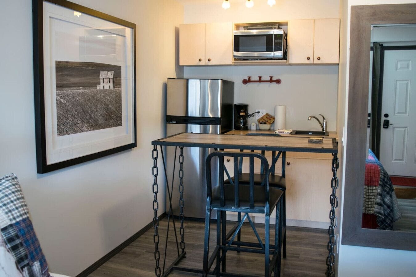 Fridge, microwave, coffee/tea maker, cookware/dishes/utensils